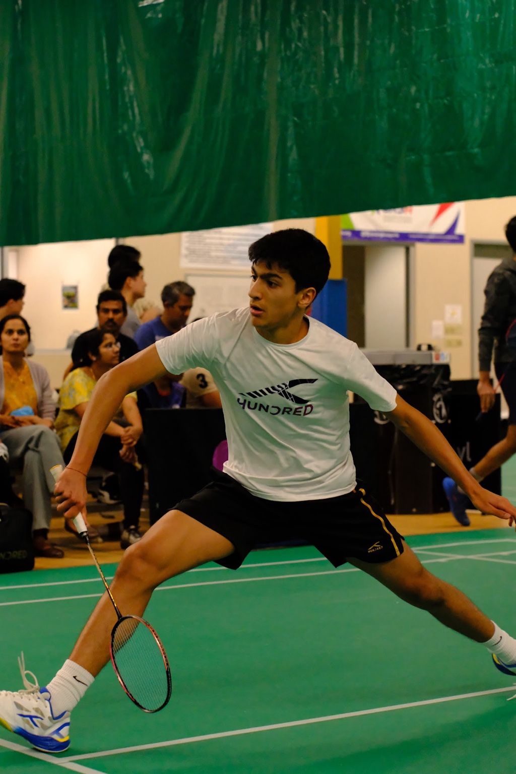 Aarav Gupta competing in a badminton match