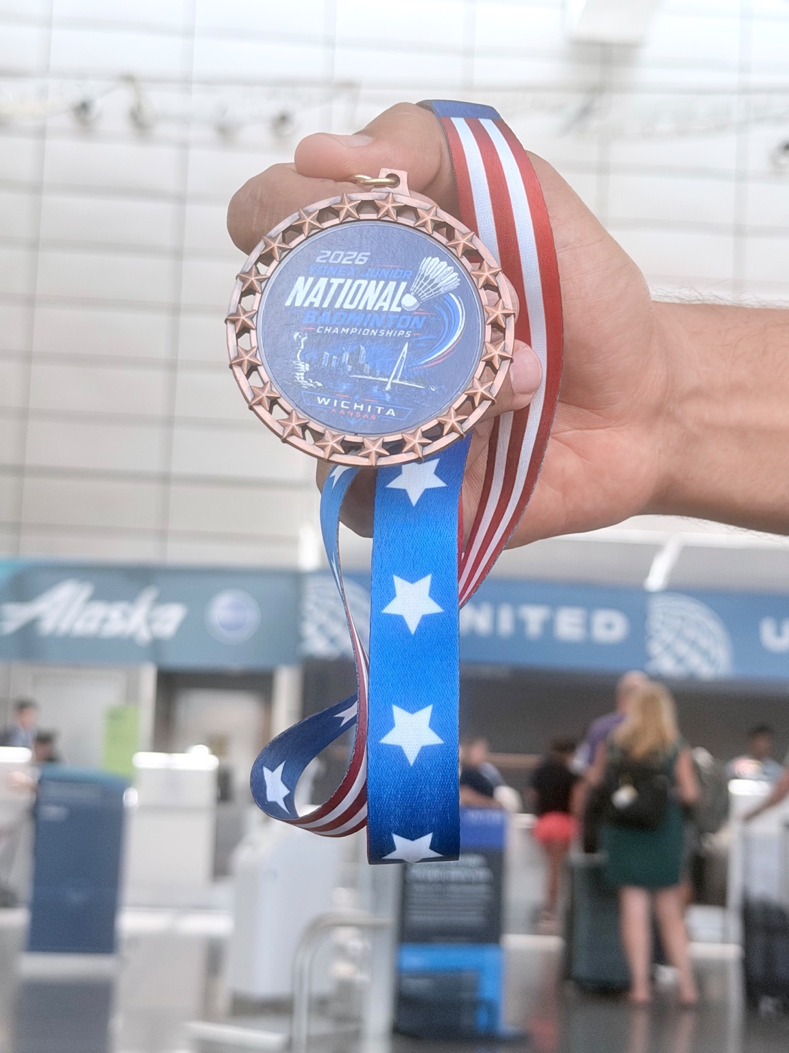 2026 Junior Nationals badminton medal from Wichita, Kansas